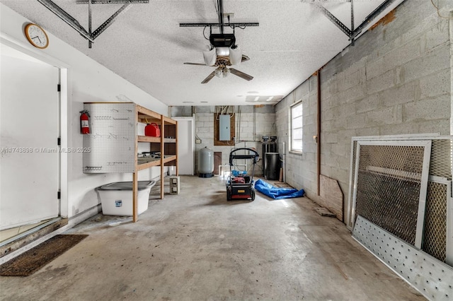 garage featuring a garage door opener and electric panel