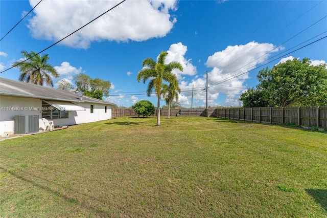 view of yard with central AC