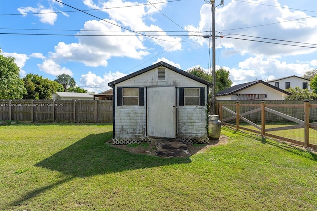 view of outbuilding featuring a yard