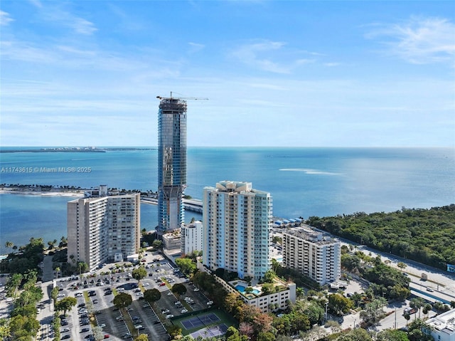 aerial view featuring a water view and a view of city