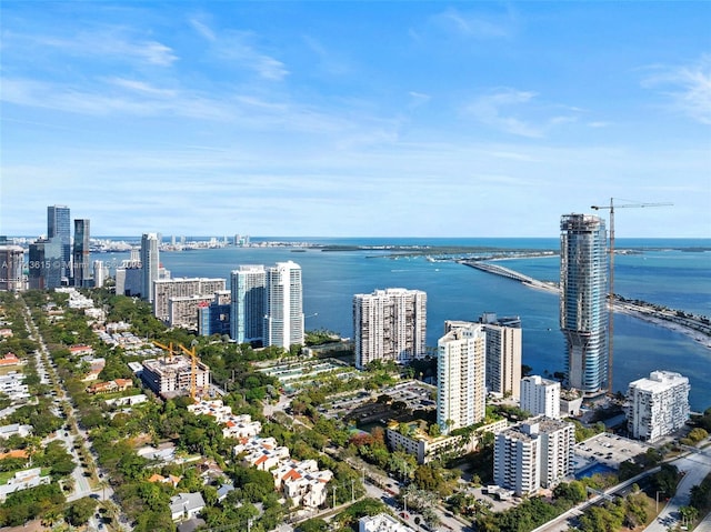 drone / aerial view with a water view and a city view