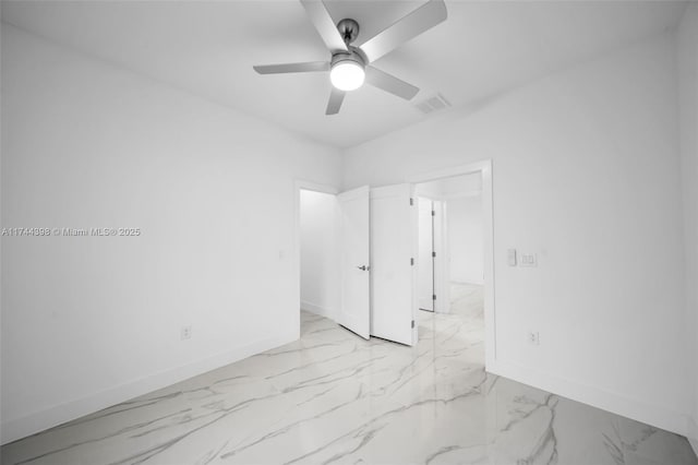 unfurnished bedroom featuring ceiling fan