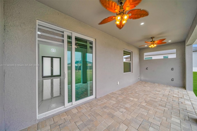 view of patio with ceiling fan