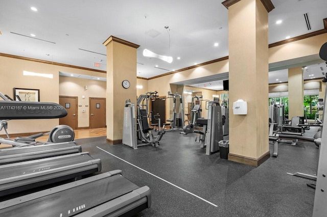 gym with baseboards, recessed lighting, and ornamental molding