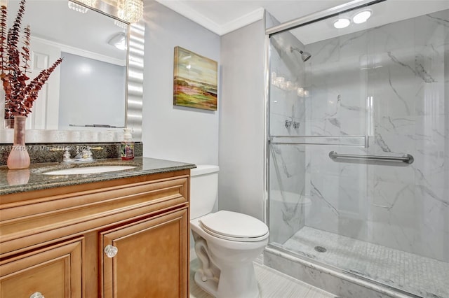 bathroom with toilet, a marble finish shower, crown molding, and vanity