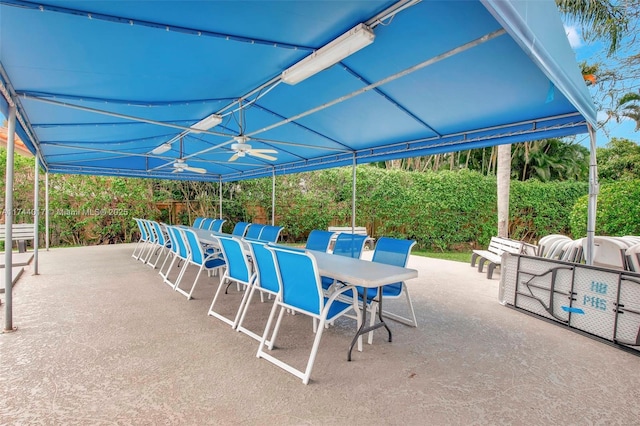 view of patio / terrace with ceiling fan and outdoor dining space