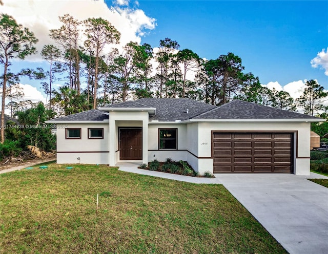 view of front of property featuring a garage, driveway, a front lawn, and stucco siding