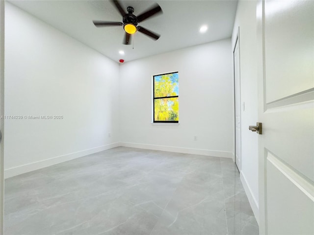 spare room featuring ceiling fan