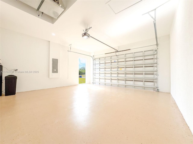 garage featuring a garage door opener and electric panel