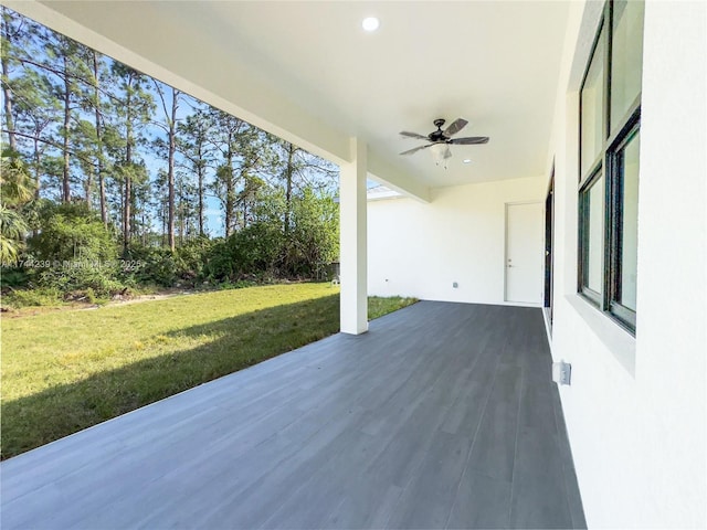 view of patio with ceiling fan