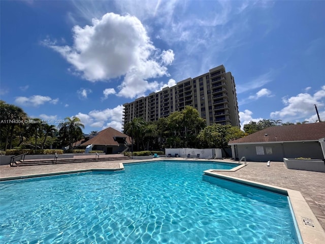 1470 NE 123rd St Unit A707, North Miami, FL 33161 - community pool with a patio