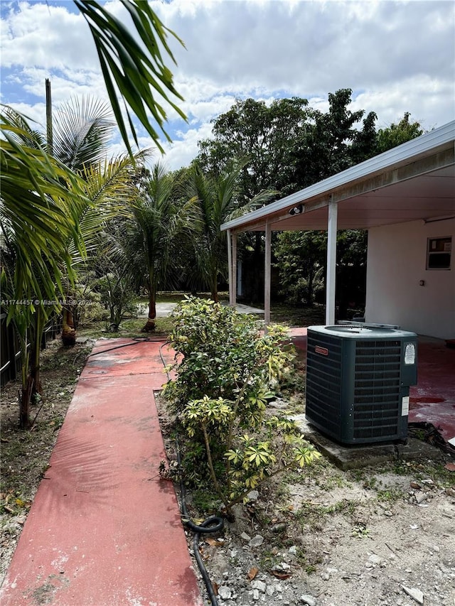 exterior space featuring central AC unit