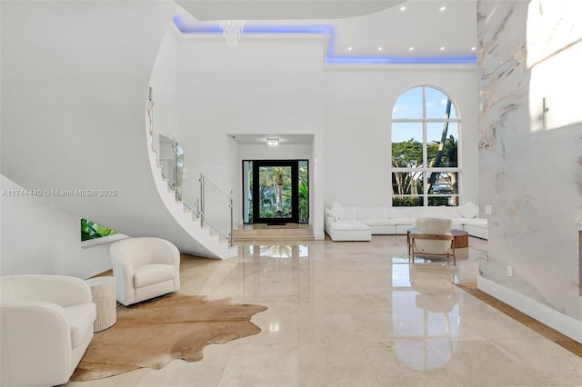 entrance foyer with a towering ceiling