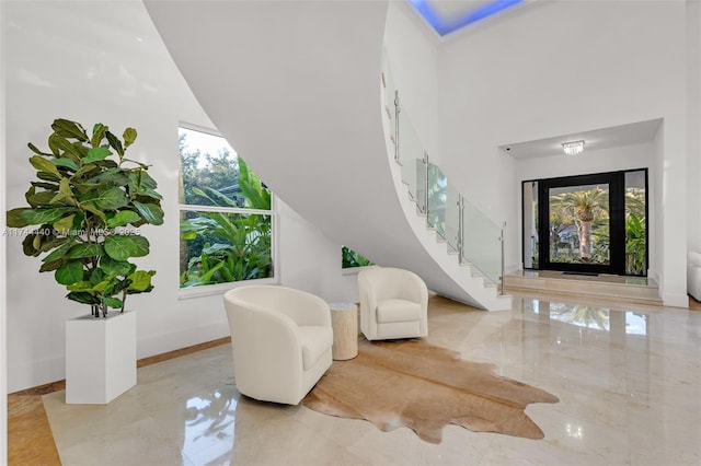 sitting room featuring a wealth of natural light