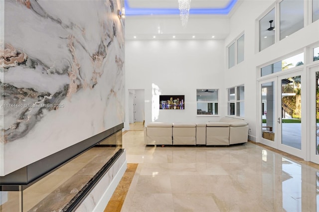 living room with a high ceiling