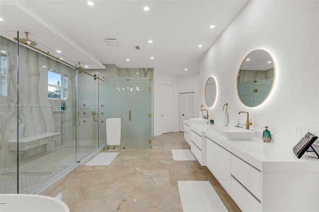 bathroom with vanity, radiator, and a shower with door