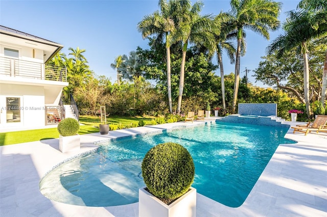 view of pool featuring a patio