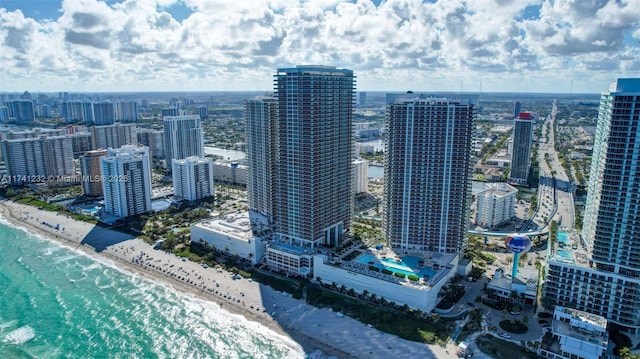 drone / aerial view with a view of the beach and a water view