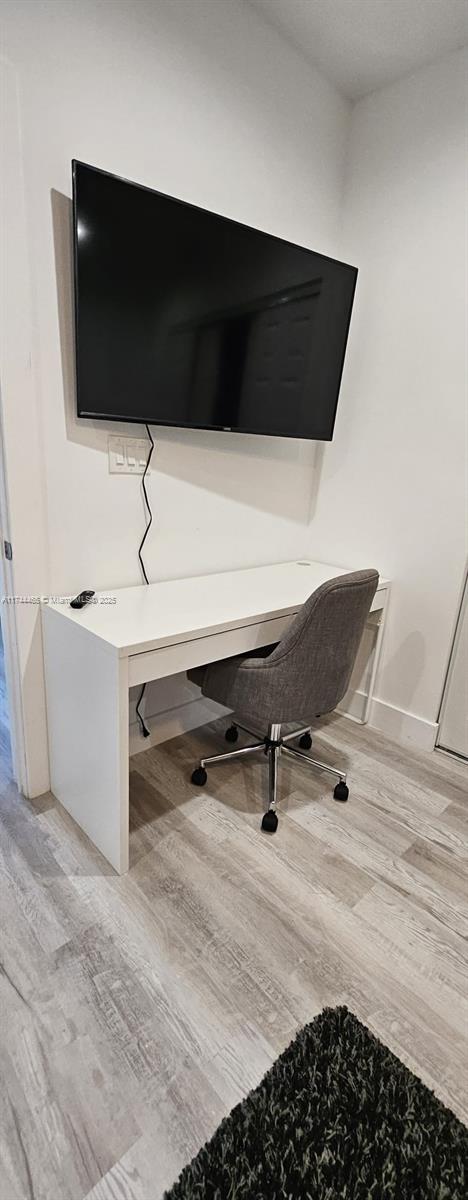 office space featuring light hardwood / wood-style floors