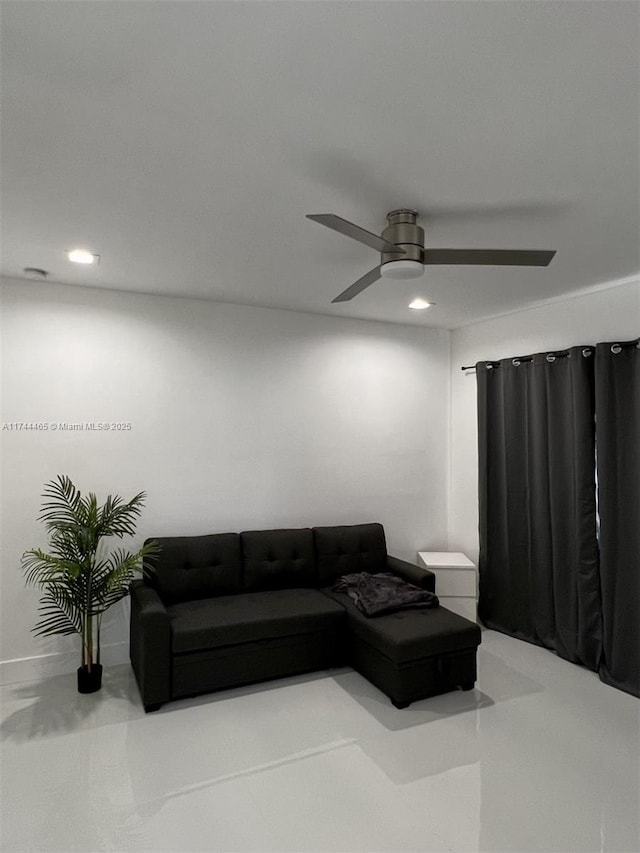 living room featuring ceiling fan