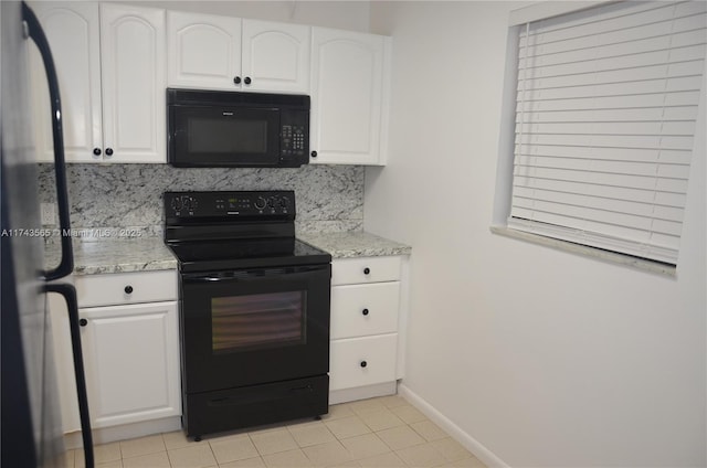 kitchen featuring white cabinetry, light tile patterned floors, decorative backsplash, and black appliances