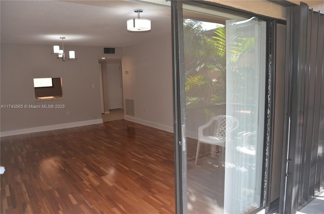 unfurnished room featuring hardwood / wood-style floors