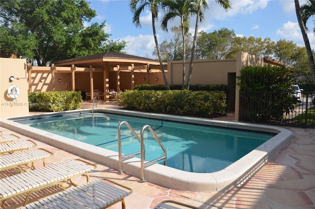 view of pool featuring a patio area