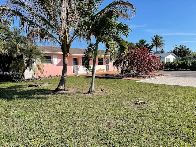 view of front of home with a front yard