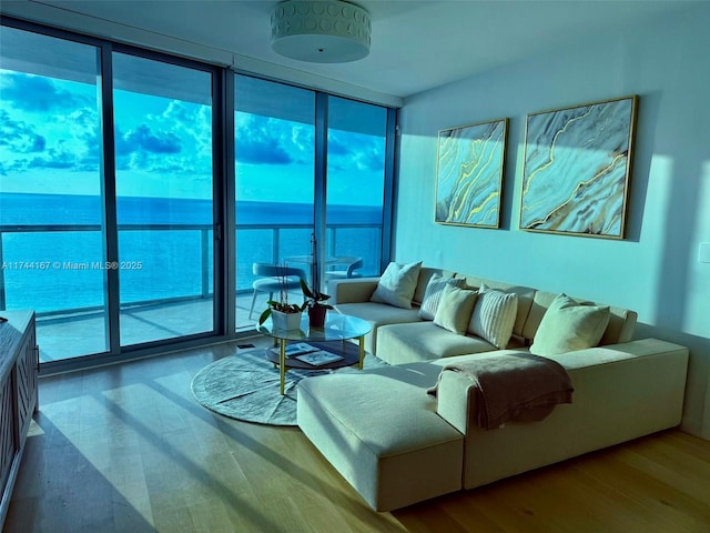 17001 Collins Ave Unit 2702, Sunny Isles Beach, FL 33160 - living room featuring wood finished floors and a wall of windows