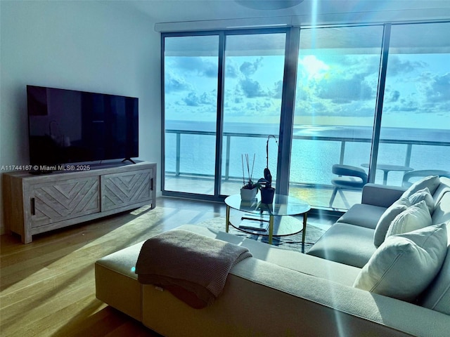 17001 Collins Ave Unit 2702, Sunny Isles Beach, FL 33160 - living room featuring expansive windows and wood finished floors