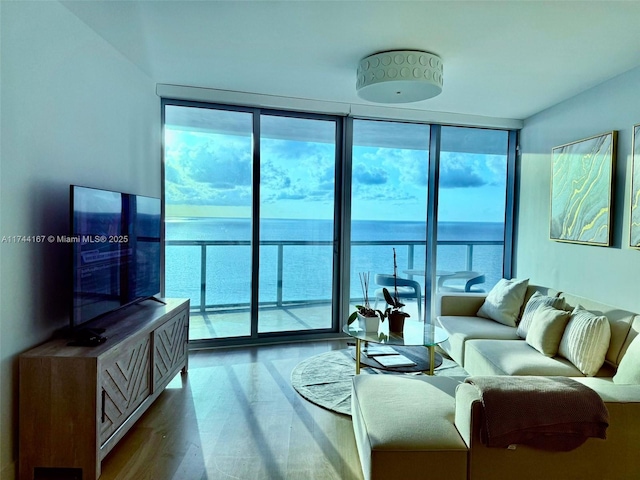 17001 Collins Ave Unit 2702, Sunny Isles Beach, FL 33160 - living area featuring plenty of natural light, wood finished floors, and floor to ceiling windows