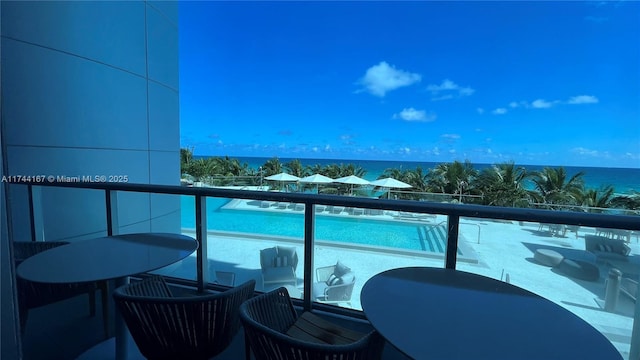 17001 Collins Ave Unit 2702, Sunny Isles Beach, FL 33160 - balcony featuring outdoor dining space and a water view