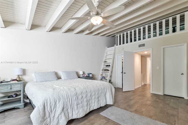 bedroom featuring hardwood / wood-style flooring, ceiling fan, wood ceiling, and beam ceiling