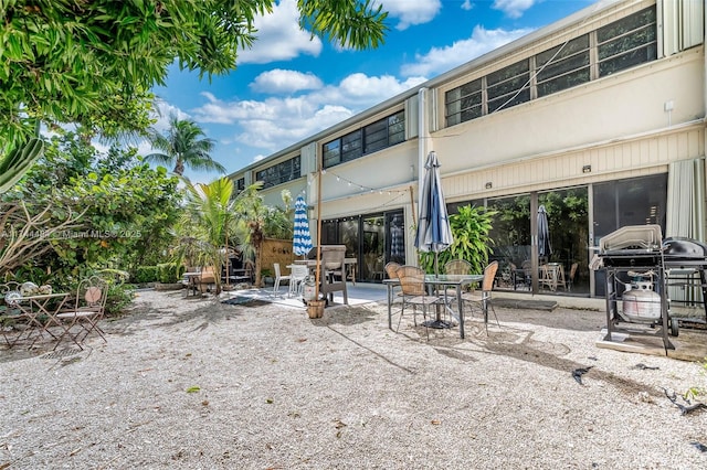 back of property featuring a patio