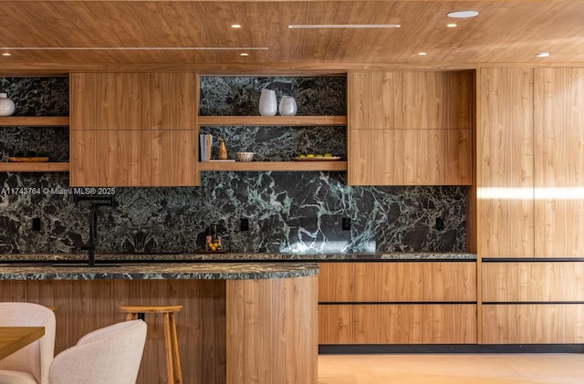 bar featuring tasteful backsplash, dark stone counters, and wooden ceiling