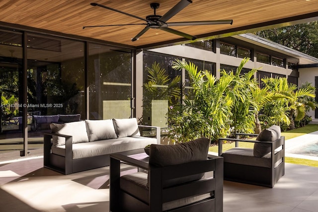 view of patio with an outdoor hangout area and ceiling fan