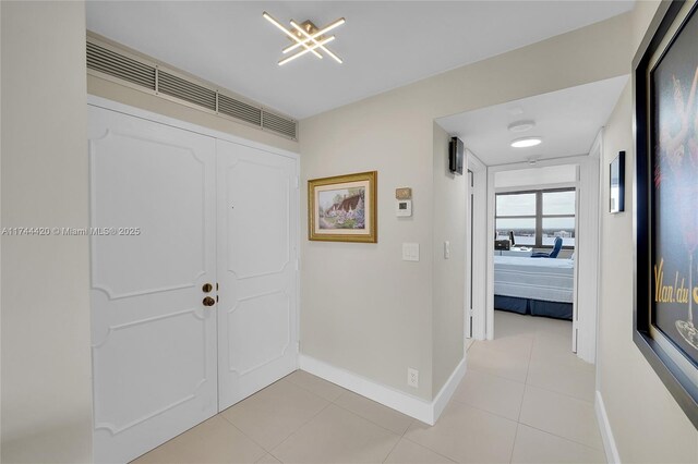936 Intracoastal Dr Unit 20E, Fort Lauderdale, FL 33304 - entryway featuring baseboards, visible vents, and light tile patterned floors