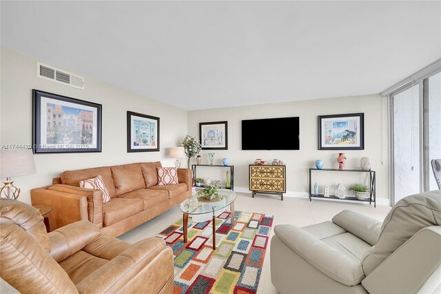 936 Intracoastal Dr Unit 20E, Fort Lauderdale, FL 33304 - living area with baseboards and visible vents