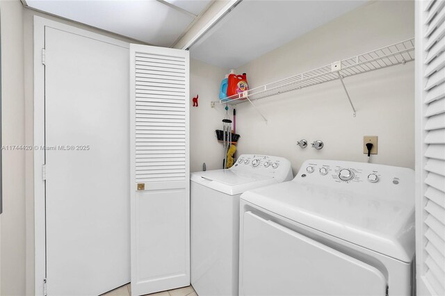 936 Intracoastal Dr Unit 20E, Fort Lauderdale, FL 33304 - laundry room featuring washer and dryer and laundry area