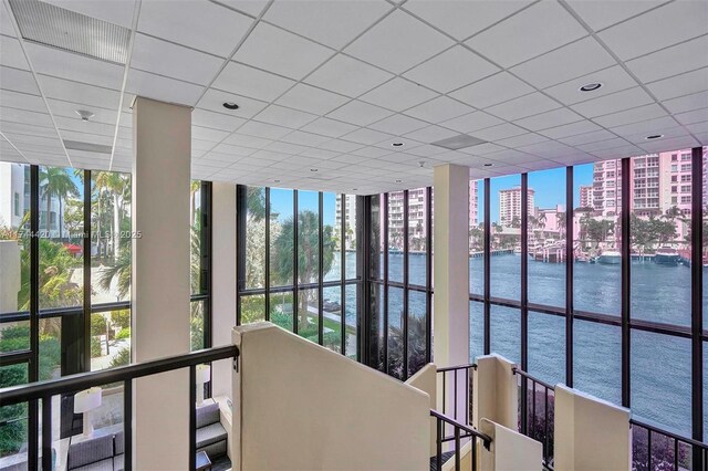 936 Intracoastal Dr Unit 20E, Fort Lauderdale, FL 33304 - unfurnished sunroom featuring a water view, visible vents, a healthy amount of sunlight, and a view of city