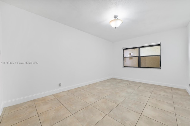 view of tiled spare room