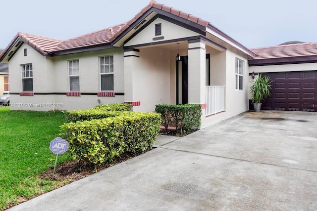 ranch-style home with a garage