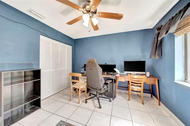 tiled home office with ceiling fan