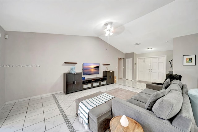 living room featuring vaulted ceiling and ceiling fan