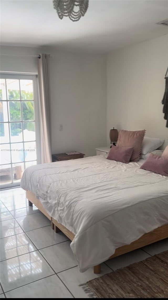 725 Fernwood Rd, Key Biscayne, FL 33149 - tiled bedroom featuring access to exterior