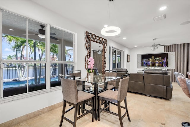 dining room with ceiling fan