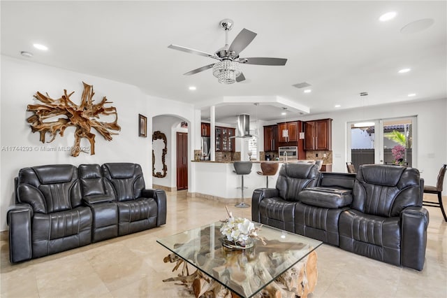 living room featuring ceiling fan