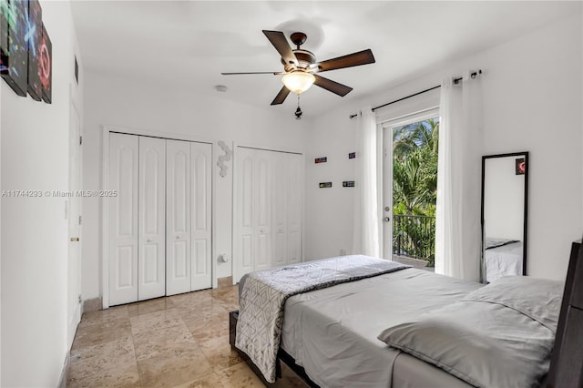 bedroom featuring access to outside, two closets, and ceiling fan