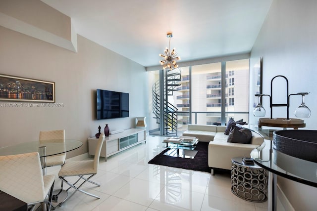 tiled living room featuring expansive windows and an inviting chandelier