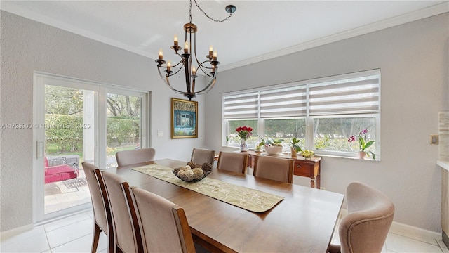 dining room featuring light tile patterned floors, plenty of natural light, and crown molding
